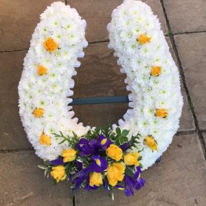 Horseshoe ribbon edging white base yellow and blue spray
